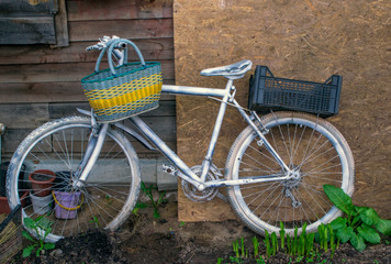 Fototapeta na wymiar old bicycle in exterior design for garden