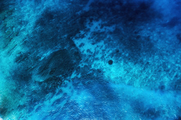 Fototapeta na wymiar Seascape at the day time. Water as a background. Turquoise water background from top view. Sea and beach. Bali, Indonesia. Travel - image