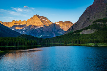 Fototapeta na wymiar 0000290_Sunrise on Mount Gould at Swiftcurrent Lake at Glacier National Park - Montana_2565