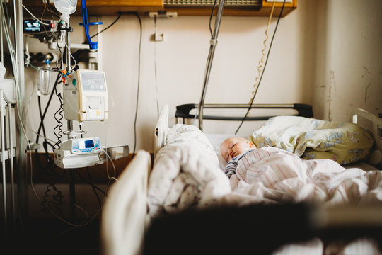 Baby child sick at the hospital with a virus coronavirus