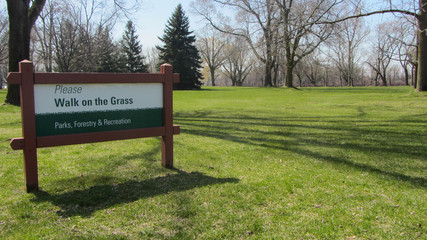 Toronto, Canada - 04 20 2013: A panel in a park of Toronto that state 