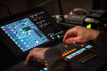 Sound engineer working in recording studio