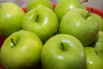 washed wet clean green apples. Fruit washing