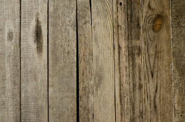 Brown wooden background of old vertical boards.