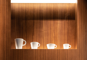 Set of cups placed in row
