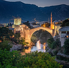 Colorful sunset over the medieval bridge of Mostar on 11 August, 2019.