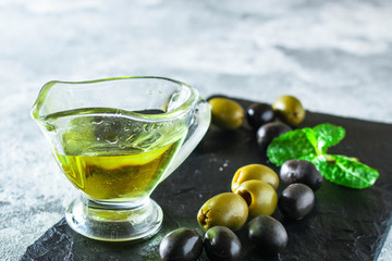 olive oil appetizer olives, cold pressed, 
menu concept food background. top view. copy spaces for text for text keto or paleo diet