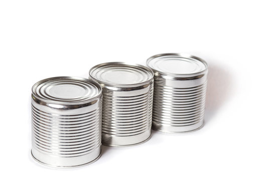 cans with preservation on a white