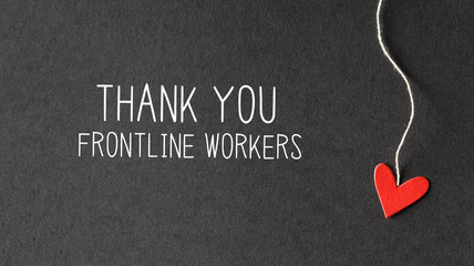 Thank You Frontline Workers message with handmade small paper hearts