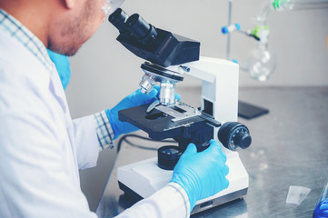 Closeup of Scientific microscope data analysis in the laboratory