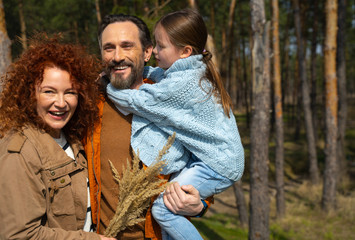 Happy loving family spending time together outdoors