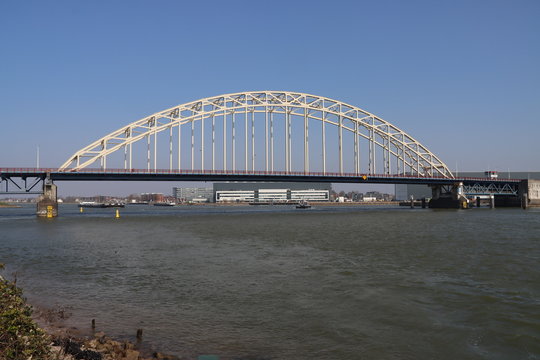 Steel suspension bridge over river Noord at Hendrik Ido Ambacht for road N915