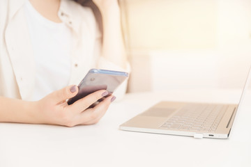 Young woman after being fired work is looking for online jobs on Internet through laptop. Concept effects of pandemic, unemployment