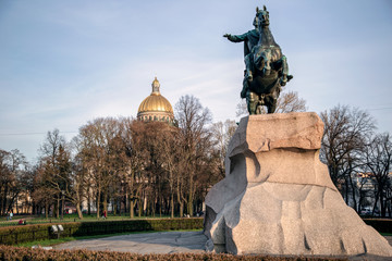 View of the Alexander Garden and St. Isaac's Cathedral at sunset. St. Petersburg Russia.