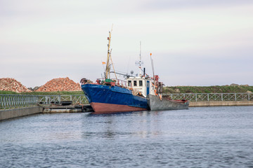 Fishing ship on the pier of Lake Ladoga. Leningrad region of Russia