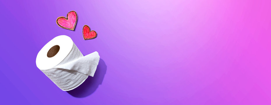Toilet paper with hearts - overhead view flatlay