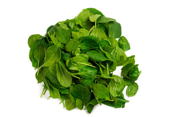 Fresh spinach leaves as background.