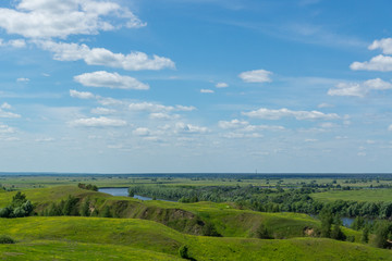 Obraz premium River landscape with hilly banks 2