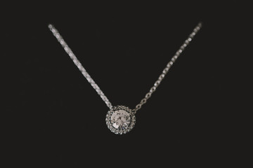 Diamond necklace close up on black background