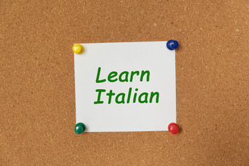 Text Learn Italian written on a sticker