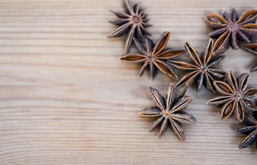 Close up of star anise on wooden background