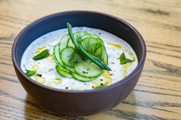 Cold summer soup with kefir, dill, onions