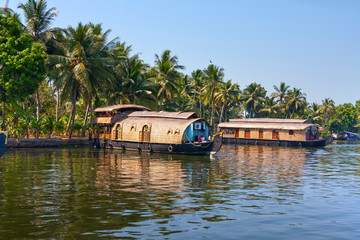 Fototapeta na wymiar Houseboat on Kerala backwaters in Alleppey, India..