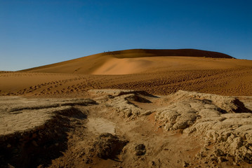 dry landscape with cracked earth dead vlei namibia