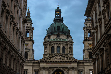 St. Stephen's Basilica at the end of the street at dusk in Budapest.