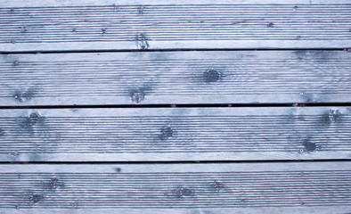 Photo of wooden gray boards isolated. The concept of flooring.