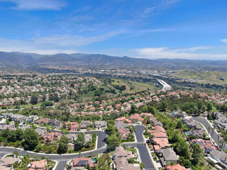 Fototapeta premium Aerial view of master-planned private communities, large-scale weatlhy residential neighborhood, big villa with swimming pool, Mission Viejo, California, USA