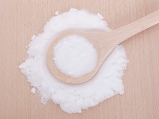 MSM pure powder in wooden spoon