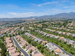 Fototapeta na wymiar Aerial view of master-planned private communities, large-scale weatlhy residential neighborhood, big villa with swimming pool, Mission Viejo, California, USA