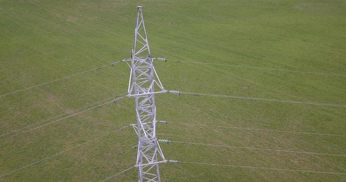 Aerial view of power pylon in filed, Russia