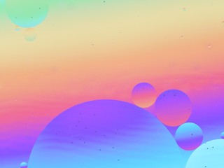 Oil and water macro abstract background with bubbles