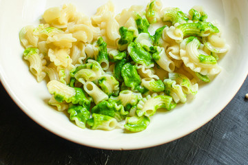 pasta creste di galli green sauce mint pesto Menu concept healthy eating. food background top view copy space for text healthy eating table setting