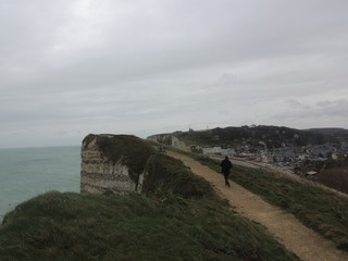 etretat cliffs on a cloudy and windy day