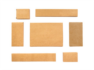 Blank kraft boxes for disposable hotel toothbrush Set kit isolated on a white background. Vanity set. Sewing set etc. Flat lay. Top view