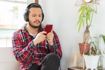 young man listening to music