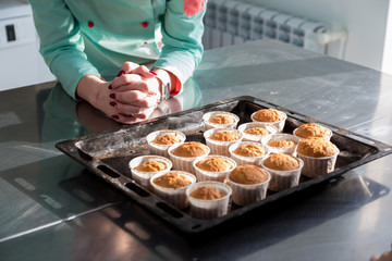 Blanks of sponge cupcakes on the table. The preparation of the dessert. 
