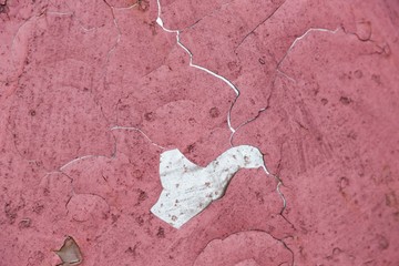 Rusty burgundy cracked metal wall, texture background