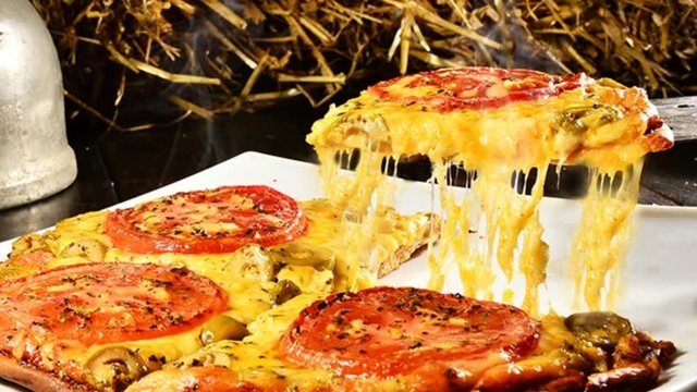 Yummy pizza steaming hot is allways  good