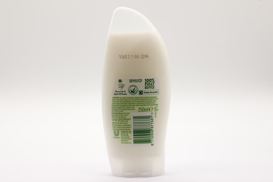 Irvine, Scotland, UK - June 22, 2020: Radox branded Shower Cream in Recyclable Plastic Bottle and Cap and Relevant Recycling Labels and symbols .