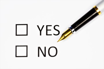 Yes or no, the choice of the answer to the voting question. Text header and pen for writing. Preference for the probability of an action or event occurring.