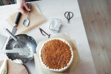 Ingredients for making a cake and Baker's tools on the table. Lifestyle. Top view.