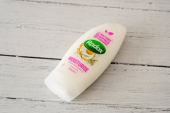 Largs, Scotland, UK - June 06, 2019: Unilever Radox branded moisturise shower cream in a plastic recyclable bottle and cap in line with present UK recycling guidelines.
