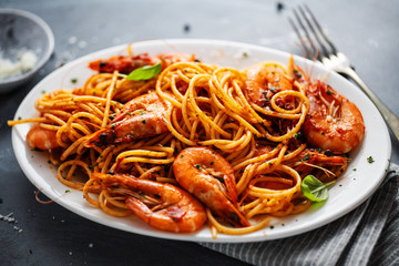 Pasta spaghetti with tomato sauce and shrimps