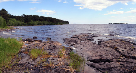 Fototapeta na wymiar Lake with rocks and forest
