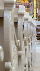 Wooden Benches in Catholic Church Aglona, Latvia. Catholic Temple Seats, Blurred Background. Religious Background. Divine Light, Grace, Hope Concept..
