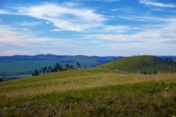 Fototapeta na wymiar Green steppes and hills on a summer day. Zabaykalsky Krai. Russia.